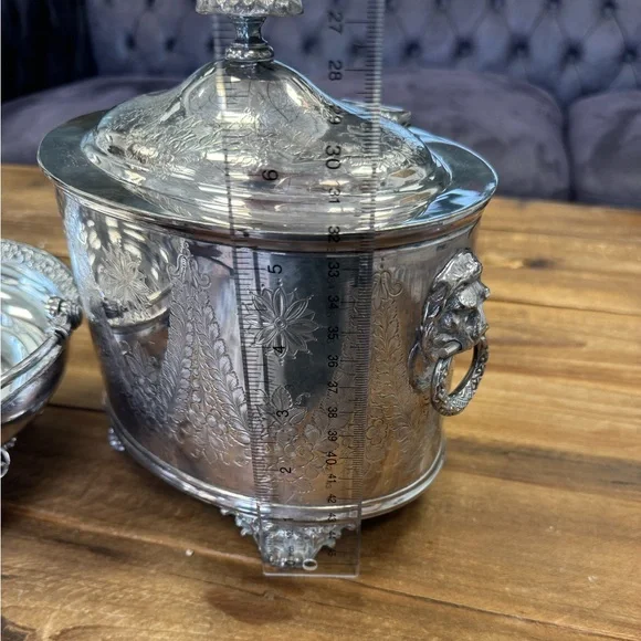 Stunning silver plated large footed bisc box with lions